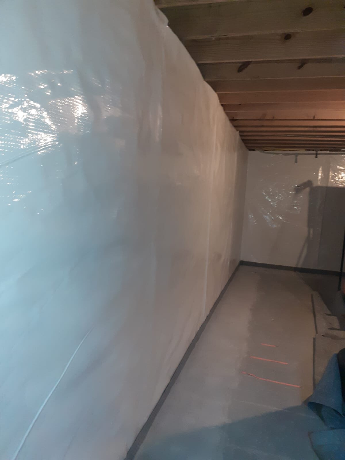 WEST-CHESTER-WHITE-CAP-MEMBRANE-1 White cap membrane applied after mold removed from wall.